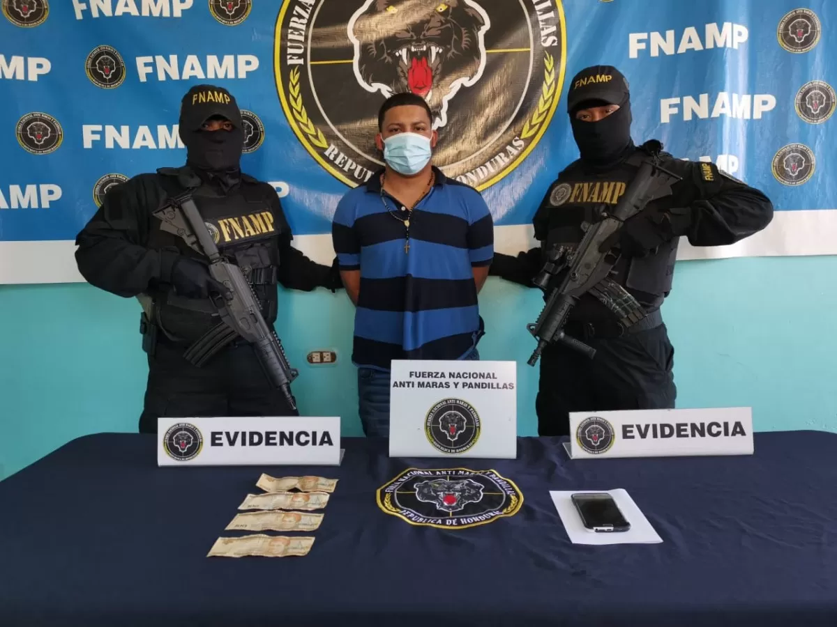 FNAMP detiene a Taxista mientras cobraba extorsión para la Organización Criminal Pandilla 18 en La Ceiba